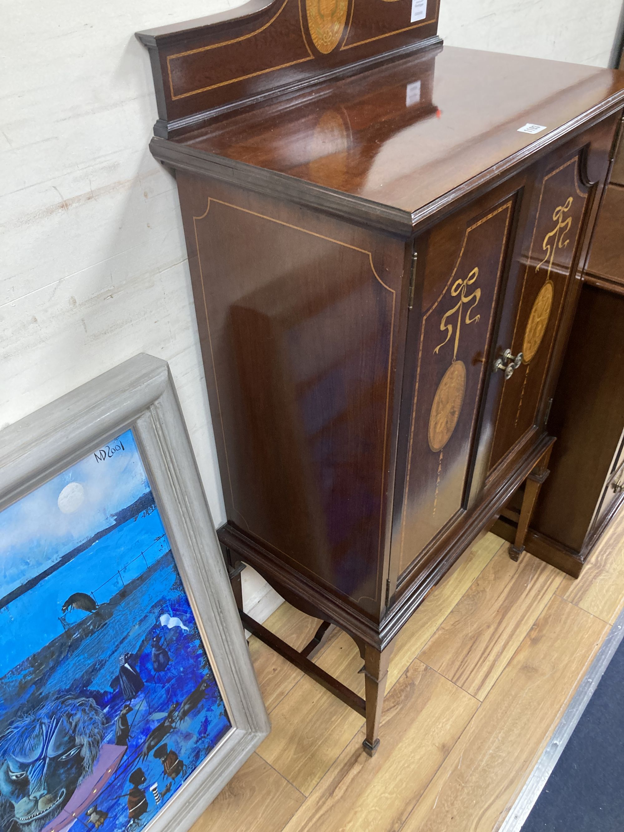 A Sheraton revival mahogany and marquetry music cabinet (later stand?), width 64cm, depth 37cm, height 130cm